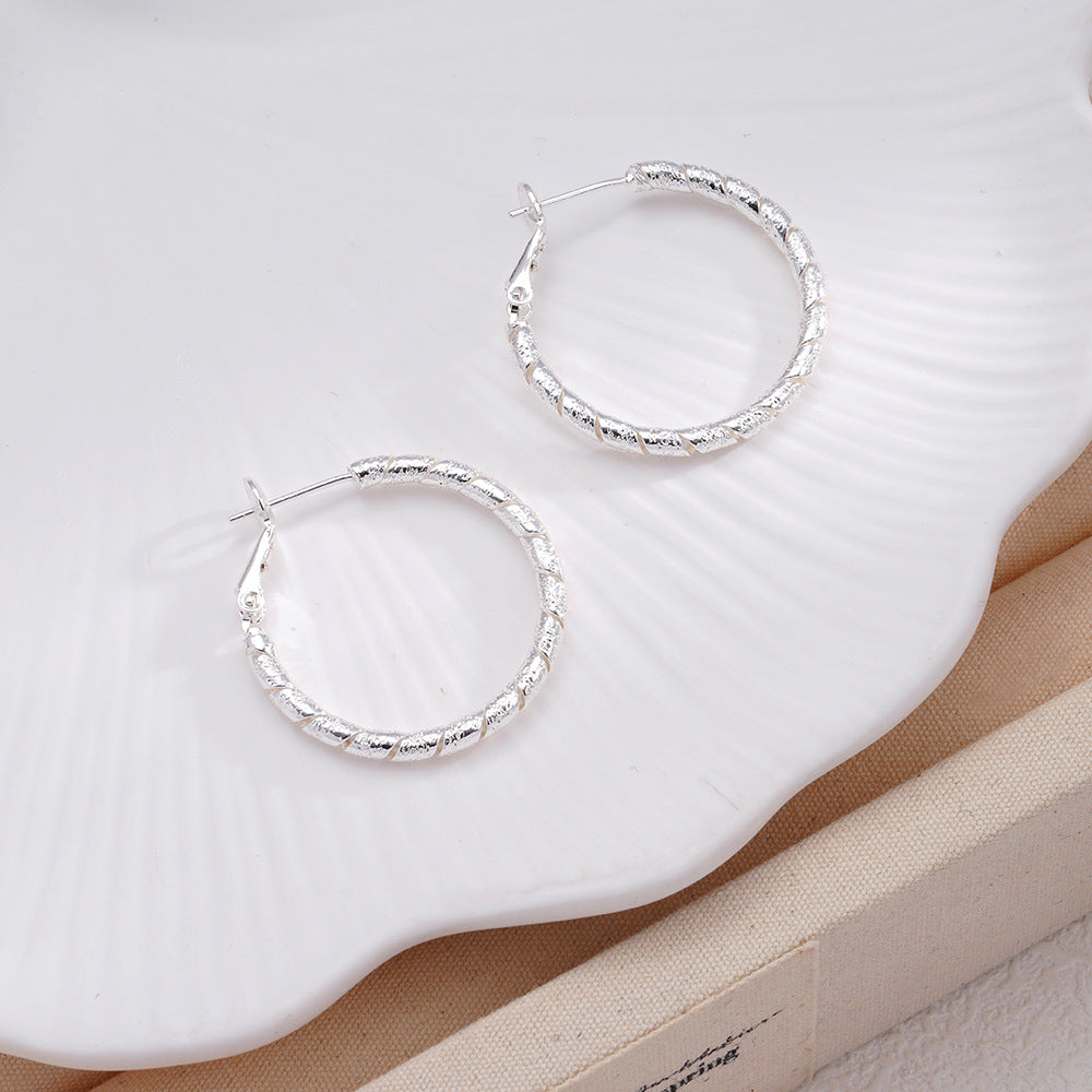 New Commuter-friendly Gold Twisted Hoop Earrings That Go With Everything